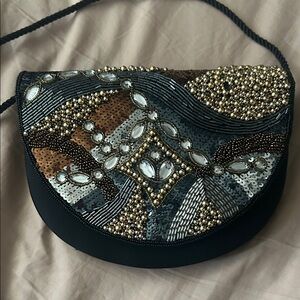 Elegant Beaded Clutch with Gold and Black Accents